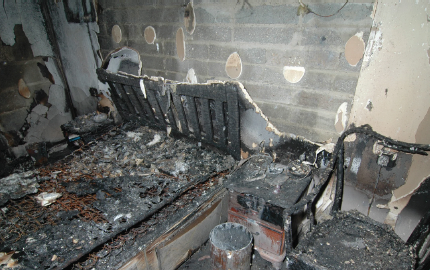 Fire-damaged bedroom without use of a Personal Protection System